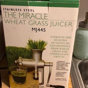 Stainless steel miracle wheat grass juicer.